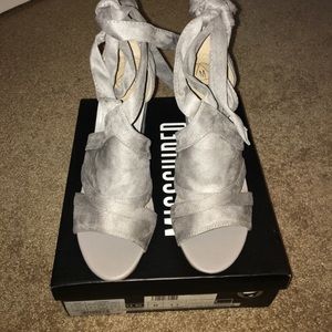 Grey faux suede tie up block heels.